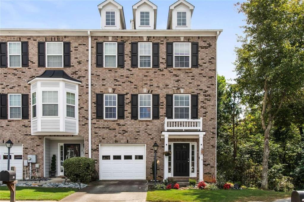 End Unit Townhome in highly sought after Millgate Crossing. Minutes from Mall of Georgia. Located in a cul-de-sac, this two bedroom, 2.5 bath home is a must see. Hardwood floors on the main level and carpet replaced less than 6 months ago on the top floor. Flex space off of the garage that is currently being used as a bedroom/bathroom combo. These townhomes don't last long, schedule your showing today!