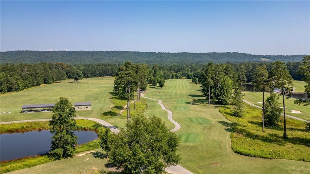 Beautiful Last Cul-de-sac lot on the Golf Course available in The Fairways Subdivision in the Armuchee area. This lot is one of the few that remain in this exclusive development, and it is situated on the #6 fairway of the beautiful Stonebridge Golf Course. It is also the last vacant lot in this quiet cul-de-sac. If you've ever wanted to build a home, and live on the golf course, this is your opportunity. Seller bought this lot with intensions to
build a beautiful custom home then found a turnkey ready home that met their wants and needs in this community. We have 3 floorplans
available from my clients local builder in this community if needed and these plans are included in the photos as well as a variety of customizable house plans for your selection.
Schedule your appointment today before it is gone!