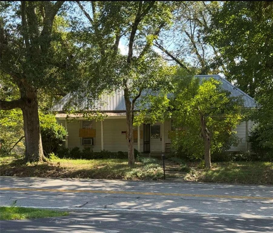 Step back in time with this 1915 home full of character and potential, situated on a spacious 1.827-acre lot. The house is a true fixer upper, ready for someone with vision to bring it back to life or create something new. With nearly 2 acres of land, there's plenty of room for gardening, outdoor living, or expansion. The location provides convenience to Jefferson, Commerce, and I-85 while still maintaining a quiet, country setting. Whether you're an investor, builder, or buyer looking for a historic home to restore, this property has endless possibilities. Home is being sold as-is with no disclosures. Owner is a licensed real estate broker.