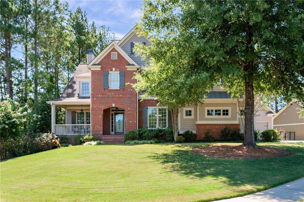 Welcome to 216 Brisbane Drive, a timeless Jeremy Rutenberg home in the heart of Bentwater, one of the most desirable master-planned communities in Acworth, Georgia. Known for its quality craftsmanship and enduring design, this residence combines elegance, comfort, and modern updates in a setting that is part of the highly rated North Paulding School District. From the moment you step inside, you’ll appreciate the freshly painted interiors, gleaming hardwood floors, and a thoughtful layout that blends timeless style with everyday livability. The main level offers a versatile bedroom and full bath, perfect for guests, in-laws, or multigenerational living, while the heart of the home is the renovated kitchen featuring stainless steel appliances, classic cabinetry, and a seamless connection to the open living and dining areas.
Upstairs, spacious bedrooms provide privacy and comfort, while the finished basement, completed by the builder, expands the home’s possibilities with flexible spaces that include a private home gym, recreation areas, media room, or office retreat. The unfinished area would make a perfect future bedroom. Outdoors, a covered deck invites year-round gatherings while overlooking the private, wooded, and fully fenced backyard—ideal for entertaining, pets, gardening, or simply relaxing in peace. A rare three-car garage provides abundant space for vehicles, storage, or workshop needs, and the home’s solid construction reflects the quality and timeless appeal that Jeremy Rutenberg homes are known for.
Living in Bentwater offers more than just a beautiful house—it provides a resort-style lifestyle with access to multiple swimming pools, tennis courts, playgrounds, a championship golf course, and miles of scenic walking trails. Conveniently located near Acworth, Dallas, and Cartersville, and just a short drive to Lake Allatoona, this home offers the perfect balance of community, comfort, and convenience. If you’re searching for a luxury home for sale in Acworth GA, look no further than 216 Brisbane Drive, where timeless design and modern upgrades come together in one of North Paulding’s most sought-after neighborhoods.