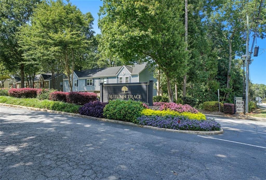 Arriving here feels welcoming from the start — the front garden, anchored by a graceful Crimson Queen Japanese Maple and kept vibrant with its own sprinkler system, sets a warm first impression.
Inside, the atmosphere leans cozy and calm, with softer light that creates the perfect backdrop for unwinding at home. Every upgrade has been thoughtfully chosen for comfort and ease: a newer HVAC system, all windows replaced, refreshed kitchen cabinetry, and stylish updates with new lighting, fans, and fixtures. With so much already taken care of, you can simply move in and enjoy.
And when you want to venture out, Peachtree Corners puts you in the middle of it all — close to highways for easy commuting, and just minutes to shops, dining, and entertainment.
HOA includes exterior maintenance, common area upkeep, pool, tennis courts, and reserve fund contributions — all designed to keep the community running smoothly and life here low-maintenance.
