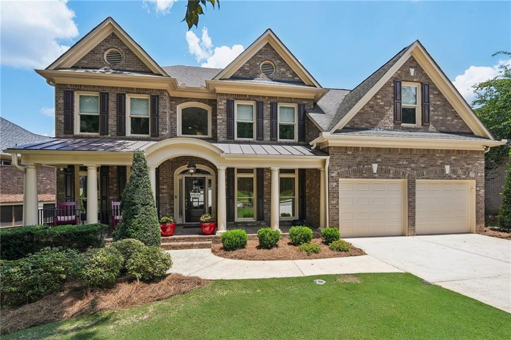 A true gem in Eastgate at Vinings Estates! 5511 Highland Preserve Drive is a must-see 3-story home with upgrades, tall ceilings, and impeccable landscaping, along with top-notch neighborhood amenities. It feels like new construction! As soon as you enter this home, you’re greeted by a rocking chair covered front porch, brick exterior with timeless columns. Inside, a formal foyer greets you with views into the private living and dining rooms. Light hardwood floors throughout the main make it feel airy and bright. The dining room can easily fit all your guests with two large windows overlooking the front yard. The living room could easily be turned into an enclosed office with plenty of natural light. The fireside family room is two stories with built-in bookshelves, a gas fireplace, custom blinds, and a wall of windows overlooking the backyard. It feels like a treehouse in the mountains. The kitchen was updated a few years ago and has a sleek tile backsplash, quartz countertops, stainless steel appliances, and an eat-in breakfast nook. Full-length back deck has a covered portion for year-round use & is ideal for entertaining or grilling out. Upstairs includes an open breezeway and primary suite. Primary suite has tray ceilings, hardwood floors, gorgeous view of the backyard, and MODEL LIKE bathroom. The primary bathroom has heated floors, double vanities with sparkling counters, a walk-in glass shower, a soaking tub, and a large closet. Three more well-sized bedrooms make up the second floor, each with well-sized closets and bathrooms. Downstairs is made for relaxing and recreation with even more livable space! Full bathroom, bedroom, wet bar, two living rooms with built-in bookshelves, and unfinished storage room! Nothing has been overlooked in this stunning craftsman-style home. The original owner has taken impeccable care both inside and out. Full sprinkler system, modern fixtures, custom blinds, nothing has been overlooked! HOA includes three pools, tennis courts, a clubhouse, and year-round social activities. Easy commute to downtown, airport, midtown, Buckhead, Perimeter Center, The Battery. 1.2 miles from Whitefield Academy, Silver Comet Bike Trail, grocery stores, restaurants, and more. More than just a house, this is the place where your next chapter begins, filled with warmth, memories, and the feeling of truly being home.