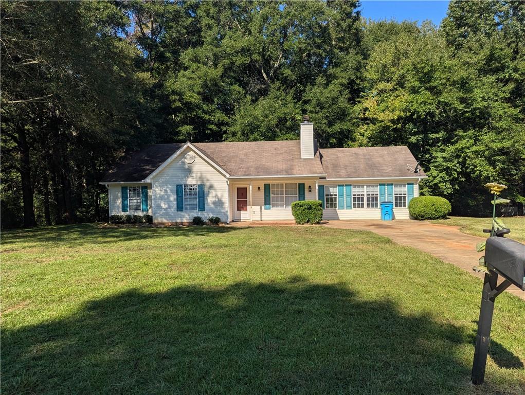 Welcome to this inviting single-family ranch-style home located in the peaceful community of Jackson, GA. Perfectly designed for comfort and convenience, this home offers the ideal retreat for families, professionals, or anyone seeking quiet living with easy access to town amenities. Large lot with plenty of outdoor space, plenty of driveway parking, and a nice quiet neighborhood setting. Pet friendly!! This charming Jackson ranch offers both comfort and privacy, making it the perfect place to call home. Schedule a showing today and see for yourself how this property can fit your lifestyle!