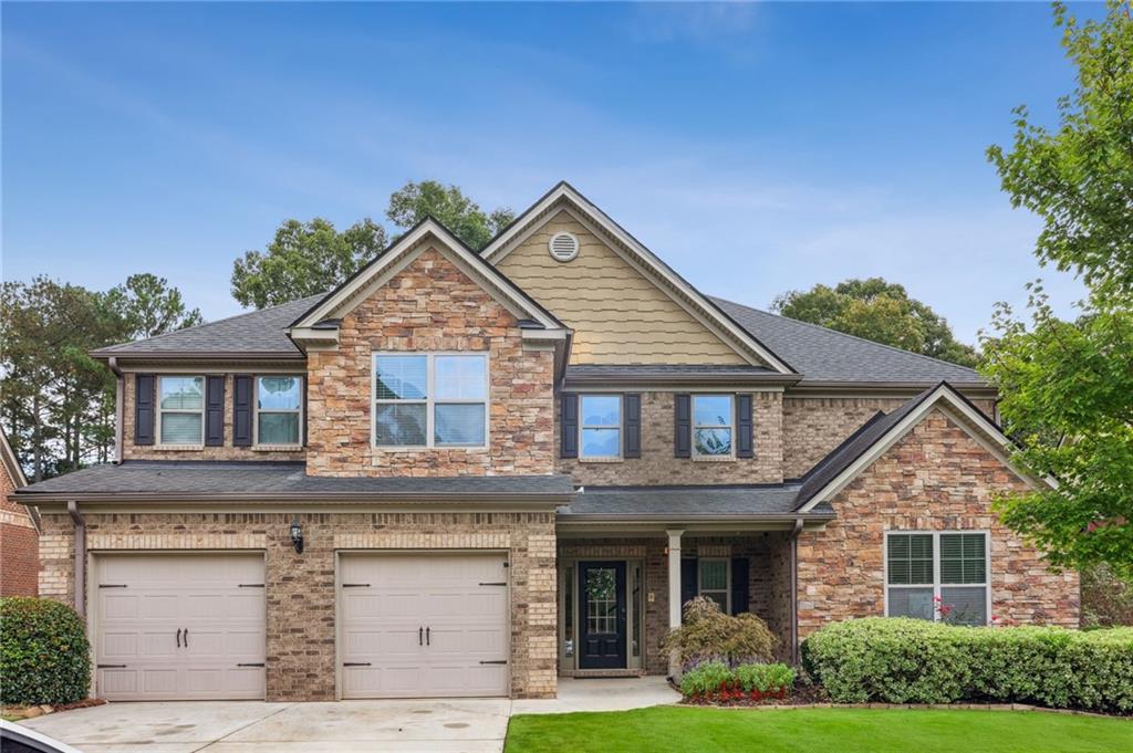 Welcome to this stunning two-story, three-sides brick home offering luxury, functionality, and timeless charm. Featuring 5 spacious bedrooms, 5 full bathrooms, and a half bath, this home is designed for both comfort and sophistication.
Step inside to discover two primary suites, including one conveniently located on the main level, perfect for multi-generational living or guest accommodations. The family room boasts a beautiful coffered ceiling, creating an inviting space for gatherings, while the separate dining room and den add elegance and versatility for entertaining or work-from-home needs.
The gourmet kitchen is the heart of the home, complete with a an island, abundant cabinetry, and a clear view to the family room, ensuring you never miss a moment with loved ones.
Enjoy outdoor living at its finest on the stone-paved patio beneath a charming pergola, ideal for relaxing or dining al fresco. Fenced back yard. Located near Mulberry Park, residents can take advantage of its sporting facilities, walking trails, and recreational areas. A swim membership is also available through a nearby pool, providing the perfect summer retreat.
Situated close to top-rated schools, this home combines elegant design, modern convenience, and an unbeatable location — a perfect place to call home.