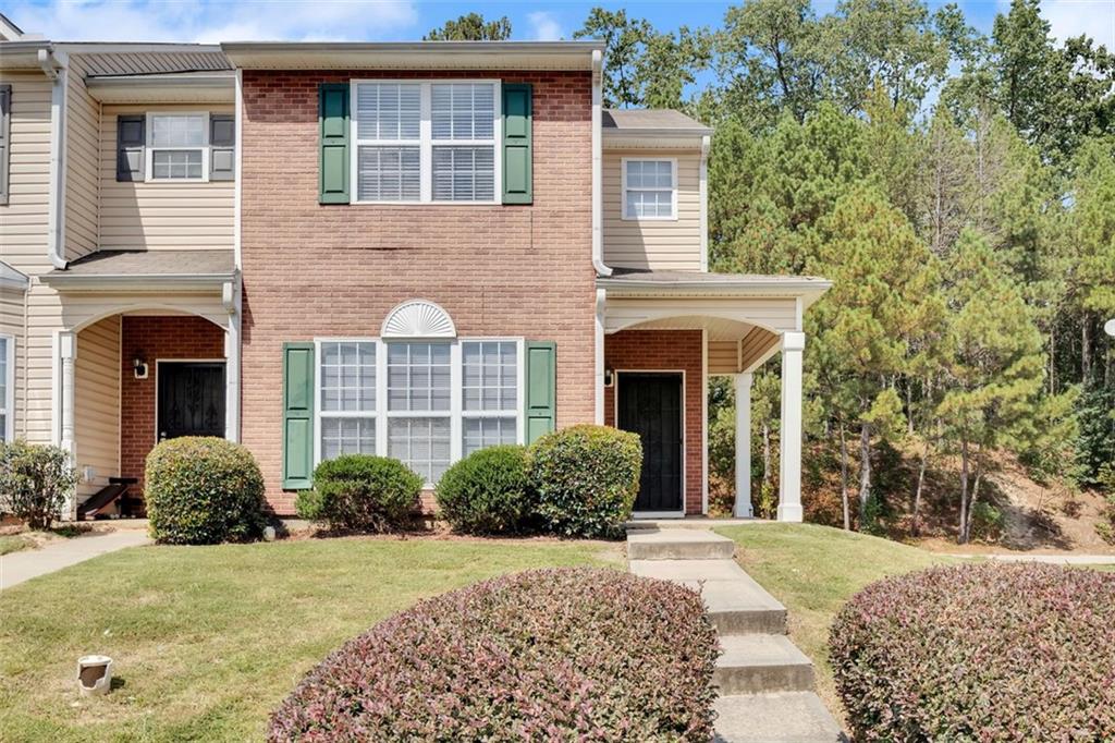 Fresh, clean, and new - with nothing to do! This beautifully RENOVATED and MOVE-IN ready Townhome is waiting for the lucky owner. All the appliances are BRAND NEW and you’ll have the first set of hands to touch the stainless steel finish. Visitors will feel welcomed upon entering your private front porch. Built in 2002, this traditional 3 bedroom, 2.5 bath, partial brick home offers security and peace, perfectly nestled as an end unit for added privacy. You’ll love the open concept layout where the white oak luxury vinyl plank flooring is the star and the designer painted walls are a close second. Indulge in culinary delight within the exquisite kitchen. The stunning new fixtures and finishes are guaranteed to impress. Each spacious bedroom has a new fan with a remote control mounted on the wall. The best thing about this home is its location. You’ll love the convenience of being able to quickly hop on I-85. Running errands and grabbing a bite to eat is easy too with Walmart only 4 mins away, 3 mins to the Dennard Library, 4 mins to the US Post Office, 3 mins to The Historic Green Manor Restaurant, and 14 mins to Hartsfield Jackson Airport. And other places are just as close: Amazon, Kraft Foods, Atlanta Metro Studios, and World Changers Church International. This peaceful community, Oakley Commons, is a hidden gem in the bustling Union City area. Enjoy the evenings walking on the sidewalks with the street lights on to guide you. This home is the perfect retreat to make your own.