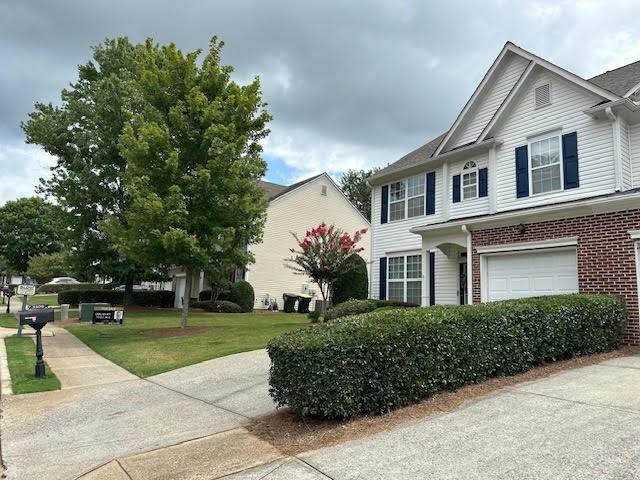 This charming 3-bedroom end-unit townhome is in a prime location and ready for you to call home. Featuring new LVP flooring downstairs. The kitchen features a breakfast bar with an open-concept design. There are sliding doors leading to the patio. The living room has a cozy gas fireplace. This home is move-in ready. Other highlights include a brand new roof & easy-care vinyl siding with Front brick accents. The home's functional floor plan is ideal for many uses. The backyard has a great entertainment patio with mature Landscaping. The Forsyth School District is very desirable. Conveniently located near shopping, restaurants, Hwy 400, the Cumming Fairgrounds, and Cumming Square, this home offers the perfect blend of comfort and convenience. Don't miss this opportunity - schedule your showing today!