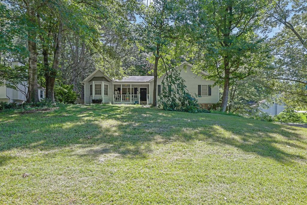 3 bedroom 2 bath, ready for you to make it your own! Large yard with a fenced backyard. So much potential! Sold As-Is.