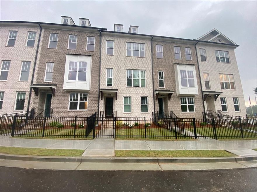 **MOVE IN SPECIAL $500 OFF FIRST MONTH'S RENT**
Gorgeous new construction 4BR/3.5BA luxury townhome in Johns Creek. Features include a spacious family room with Chef's Kitchen on the main level, hardwood floors, quartz countertops, stainless steel appliances, gas range, white cabinets, and a large kitchen island. The main floor also has a private deck and a half bath. Upstairs includes a primary bedroom with en-suite bath, walk-in shower, soaking tub, and an oversized closet, plus two more bedrooms with a shared bathroom. Laundry room with washer/dryer provided. Lower level features an additional bedroom with attached bath and a two-car garage. Located near shopping, restaurants, and top destinations like Avalon, Halcyon, and Downtown Alpharetta. Sorry, no pets.