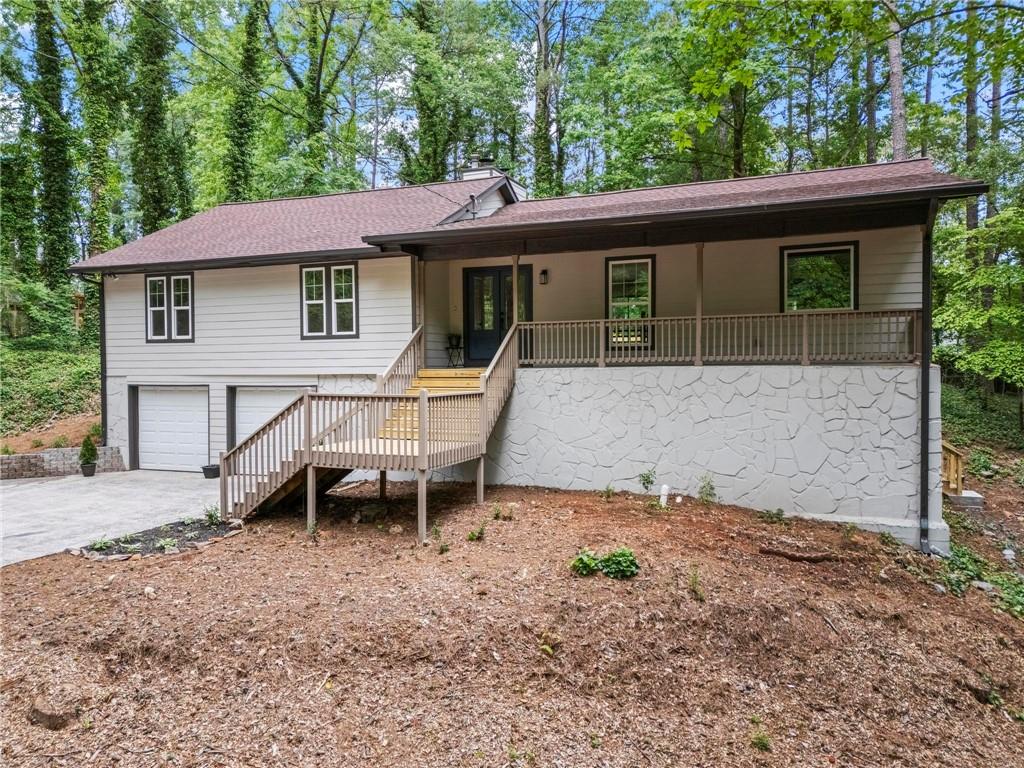 Step into modern, comfort and style with this beautifully renovated home, nestled in one of East Cobb’s most sought-after school districts...Sprayberry High School. This move-in-ready property boasts an open floor plan and a sleek, contemporary design throughout. No detail was overlooked—enjoy ALL NEW: LVP flooring, fresh paint, new decks, cement siding, plush carpet, stylish tile, updated vanities, brand-new garage doors, and top-of-the-line appliances. The heart of the home is the completely redesigned kitchen, featuring modern finishes, new cabinetry, and a layout perfect for entertaining. A standout feature is the oversized 28x28 garage, offering not only generous parking space but additional storage. The partial unfinished rooms in the basement are ideal for a workshop, home gym, or additional storage. Don’t miss your chance to own this turnkey gem less than 10 minutes to Barrett Parkway, 575/75 and so much more!