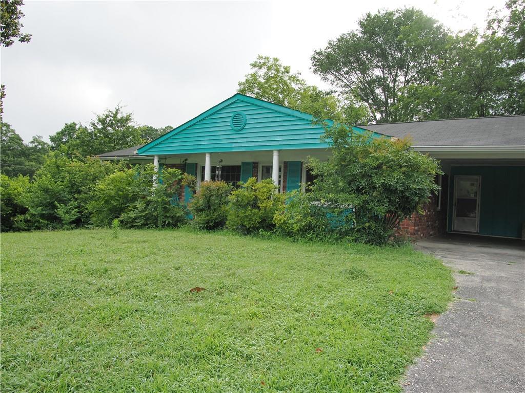 Charming Brick Home with Bonus Space and Renovation Potential.
Discover the possibilities in this solid brick home, full of character and ready for your personal touch. Offering 3 full bedrooms, a spacious bonus room, and a flexible layout, this property is ideal for homeowners or investors looking to add value and create something special.
Step inside and you’ll find an ample kitchen with a breakfast area—the perfect space to start your mornings. While the kitchen needs updating, the seller has already taken a big step forward by purchasing brand-new granite countertops, which are included in the sale. This gives you a valuable head start on your renovation and a glimpse into the potential this space holds.
The home features three bedrooms, and two full bathrooms, in addition, there’s a large bonus room that offers incredible flexibility. Use it as a second living area, playroom, home office, or even convert it into a fourth bedroom—whatever suits your needs.
The HVAC system is approximately 10 years old, and the water heater was manufactured in 2020, so some of the major systems have already been updated. With those essentials in place, you can focus your efforts on the cosmetic updates that will truly transform the home.
Outside, you’ll enjoy both a front porch that’s perfect for relaxing with a cup of coffee and a covered back patio ideal for outdoor dining or weekend barbecues.
The home is being sold as-is, giving buyers the opportunity to update it to their taste without paying a premium for someone else’s choices. Whether you're looking to create your dream home or invest in a property with great bones and even better potential, this house delivers.
Bring your vision and creativity—this home has the layout, structure, and location to become something truly special. The combination of a solid brick exterior, generous interior space, flexible bonus room, and valuable upgrades like the included granite countertops and newer water heater make this a standout opportunity. If you're ready to roll up your sleeves and make a smart investment, schedule your showing today. Homes with this kind of potential, space, and value don’t come around often!