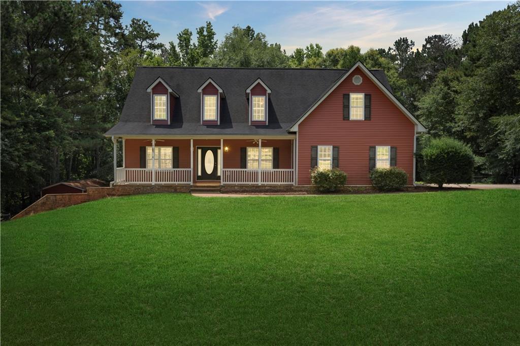 Unlock endless possibilities with this spacious McDonough home at 239 Berry St, GA 30252—featuring a fully finished basement apartment with private entrance, perfect for generating rental income, hosting long-term guests, or as an in-law suite. The backyard is fully fenced, making it ideal for pets, kids, or gardening. Two outbuildings provide ample storage or workshop space, giving you plenty of room for hobbies or equipment. At the back of the property, a year-round running stream adds a peaceful, natural border. With its versatile layout and income potential, this property is a smart choice for anyone looking for extra space and opportunity. ***Home Warranty Included***
