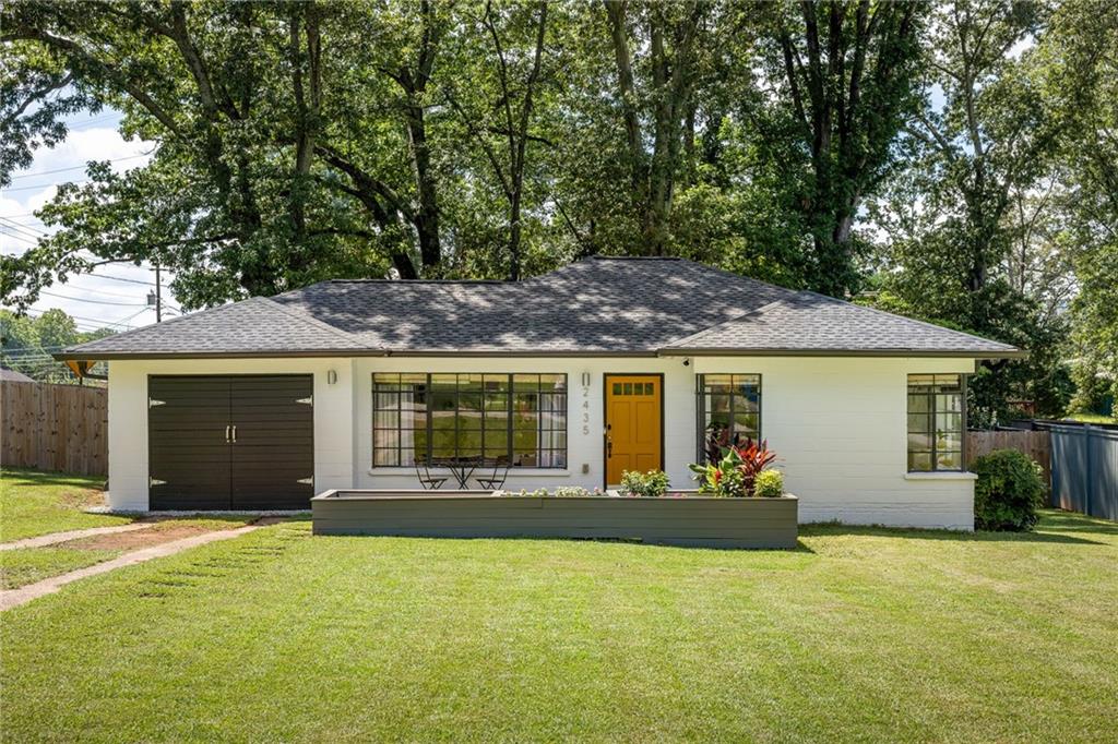 The most perfect starter home to ever exist! As soon as you pull up you'll know that this is THE ONE, curb appeal is 10 out of 10. Mid-century vibes are impeccable with original steel frame windows and a large terrace surrounded by raised garden beds. Step inside and you'll be greeted with an open-concept living space with tons of natural light, perfect for your ever growing plant collection. The updated eat-in kitchen provides plenty of space for a dinner party or large door dash order, the choice is yours! Down the hall you'll find two good-sized bedrooms, ideal for sleeping or working or crafting or whatever it is you might do in a bedroom. The bathroom has also been recently updated and is definitely punching above it's weight, with plenty of storage and designer tile throughout. Out back you'll find a large deck for grilling or sun bathing and the biggest yard you've ever seen, the opportunities back here are endless. East Point is a hidden gem just a 10 minute drive to the airport and 15 minutes to downtown Atlanta. A strong tight-knit community with neighbors that have lived there for decades. Between downtown East Point and neighboring Hapeville and College Park there are TONS of restaurants, bars, and coffee shops to check out. Opportunities at this price point are becoming harder and harder to find, don't miss out on your chance at home ownership. $4,500 lender grant available with Jasmine Mortgage Team, listing agent can provide more information.
