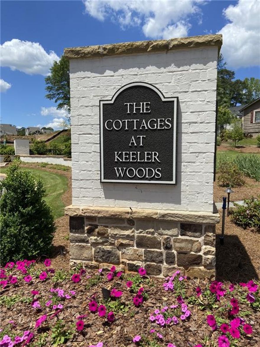 Fantastic opportunity to purchase a beautiful lot and build a custom home in the exquisite neighborhood of The Cottages at Keeler Woods - located close to the Historic Marietta Square, Kennesaw Mountain and in West Side Elementary school district. This Lot can be purchased with adjoining lot #21 if a double lot is desired.  Custom homes must be designed by Caldwell-Cline Architects and built by Elliott Custom Homes. There are also 4 home plans designed by Roger Caldwell at Caldwell-Cline that are available. The neighborhood is gated and in a great location close to area shopping, restaurants, and schools! Lot sits across from the neighborhood green space where you can enjoy the use of the picturesque community pergola or sit by the relaxing fire pit. Annual HOA dues are $1,000 and the annual landscape maintenance fee is $1,785.