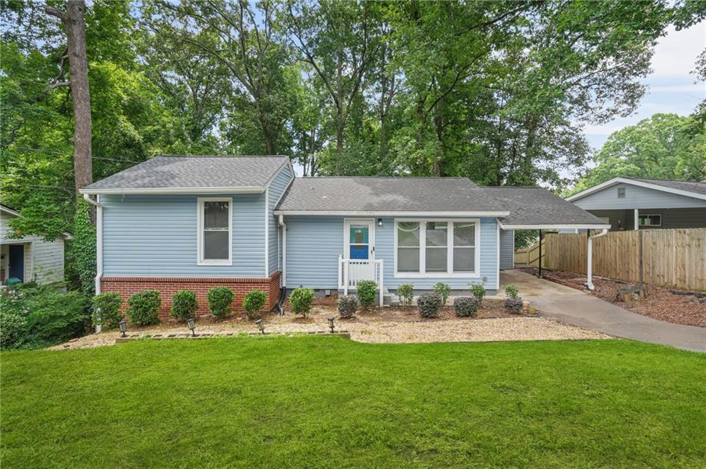 Welcome to your next chapter in the heart of Smyrna! This beautifully updated 4-bedroom, 2-bath home offers the perfect blend of comfort, flexibility, and prime location. From the moment you step inside, you'll be greeted by rich hardwood floors that flow seamlessly throughout the main living spaces, setting the tone for warmth and style. Upstairs, retreat to your serene primary suite, your personal haven at the end of the day, alongside a spacious secondary bedroom perfect for family or guests. Downstairs, discover a layout designed for real life: two additional bedrooms, a full bath, and a separate backyard entrance ideal for a home office, private guest suite, or teen retreat. You’ll also fall in love with the show-stopping kitchen and beautifully renovated bathrooms, thoughtfully designed with modern finishes that deliver both style and function. Step outside to enjoy quiet mornings or lively get-togethers on the back deck, all overlooking a large, flat, fenced-in yard that offers room to roam, play, or simply relax. All this, just minutes from Smyrna Market Village, West Village, the Silver Comet Trail, Cumberland Mall, Truist Park, The Battery, and more. With quick access to major highways, parks, pools, dining, and entertainment, you’re exactly where you want to be. This home isn’t just a great move, it’s a smart one. Come see for yourself.