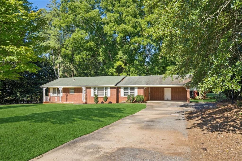 1.46 Acre private home site near downtown Alpharetta & Milton, this property offers a rare opportunity to enjoy privacy and space while remaining just minutes to the area's most desirable destinations. Nestled on quite Cowart Road, the land is surrounded by mature trees, open green space and the charm of Milton's equestrian countryside. Located less than 10 minutes to downtown Alpharetta, Avalon, and Crabapple Market, the setting combines the
best of both worlds - a peaceful retreat and easy access to premier dining, shopping, and entertainment. The lot
also sits within the highly regarded Summit Hill, Northwestern and Cambridge High School districts. Whether you're seeking a site for a custom home, space for outdoor living, or simply an investment in one of North Fulton's most coveted areas, this property delivers both lifestyle and location.