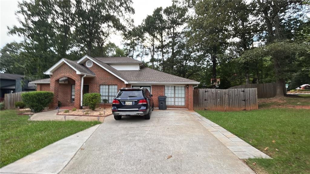 This beautiful home located at 2001 Hunters Cove , is located in the sought-after Hunters Cove subdivision, is a spacious 4 -bedroom, 2.5-bathroom two-story move in ready home of living space on a 0.30-acre lot. It was originally built in 1988 and was once the model home of the community. Fully renovated including fresh paint, and a newer roof and HVAC. It has an open floor plan great for entertaining and living. Beamed ceiling and a cozy fireplace the living room. A fenced backyard, covered patio, and a enclosed screened porch perfect for relaxation or hosting gatherings. Located in the Discovery High School cluster, zoned for Cedar Hill elementary and J.E. Richards Middle School. No HOA restrictions, increasing flexibility for homeowners.