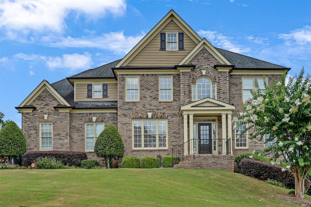 Welcome to 1205 Water Shine Way in one of Snellville's Sought after Premier Lake Communities, Bright Water! Located in award winning Brookwood School District. This beautifully maintained, home offers three spacious levels of living. Home is situated on a level landscaped lot with custom built multi-level deck in pristine condition—perfect for entertaining or peaceful outdoor enjoyment. Nestled in a sought-after neighborhood, residents enjoy top-notch amenities including a clubhouse, swimming pool, tennis courts, playground, and scenic fishing and canoeing lake. Backyard is fenced in for your fur-fam to have a healthy outdoor life. Step inside to find a gently lived home with thoughtful details. Home offers bedroom on the main with full bathroom, fabulous kitchen with big island, walk-in pantry, trash compactor, family room offers double-story foyer for a grandeur feel, formal dining has a butler pantry on the side to make entertaining easy and organized. Upgraded 2nd level offers 4 bedroom, includes Spacious Master Bedroom with a cozy sitting room and grand master bathroom. It also offers 3 additional bedrooms and 2 additional full bathrooms. Each bedroom offers its own access to the bathroom. Full exterior entry basement is stubbed for bathroom and framed, a blank canvas for what you envision. Whether you're gathering with family, hosting guests, or relaxing in your private retreat, this home offers space, comfort, and timeless quality. Additionally, new HVAC system recently replaced and sprinkler system. The community offers clubhouse, pool, multiple tennis courts, playground, serene lake for fishing and canoeing. The community oozes pride of ownership starting with well manicured entrances, beautifully kept and maintained community common areas. Amazingly landscaped yard after yard. This home & the community checks off many boxes on the list of quality, serene, and peaceful living.
Don't miss your chance to own in one of Snellville's most desirable amenity-rich residential community!