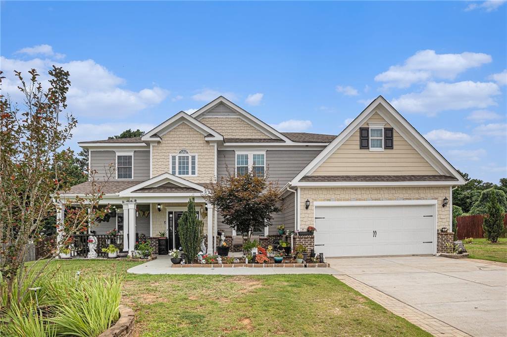 Welcome to this exquisite custom-built 6-bedroom, 4-bath home in the highly sought-after Sutherland community! This impeccably maintained residence offers the perfect blend of elegance, comfort, and convenience—featuring countless upgrades throughout. Located just minutes from Chimneys Golf Course, Fort Yargo State Park, local parks, downtown Winder, and Hwy 316, this home provides easy access to recreation, shopping, and dining. Step inside to an inviting open floor plan adorned with custom tile and marble in the foyer. The two-story grand great room impresses with coffered ceilings, rich crown molding, and an abundance of natural light. The main level features two bedrooms and a full bath with a step-in shower—perfect for guests or multigenerational living. The spacious kitchen is an entertainer’s dream, showcasing granite countertops, custom trim, LVP flooring, and a massive island overlooking the family room. Upstairs, unwind in the oversized owner’s suite complete with a cozy sitting area, shiplap accents, LVP flooring, and a spa-inspired en suite with custom tilework, soaking tub, double granite vanity, and a large walk-in closet. Three additional bedrooms and two full baths complete the upper level. Set on a large, level, fenced-in lot, with a storage shed/workshop, this backyard is a private retreat with the beginnings of an outdoor kitchen—ready for your personal touch! Don’t miss this rare opportunity to own a beautifully upgraded custom home in a PRIME location. Schedule your showing today!