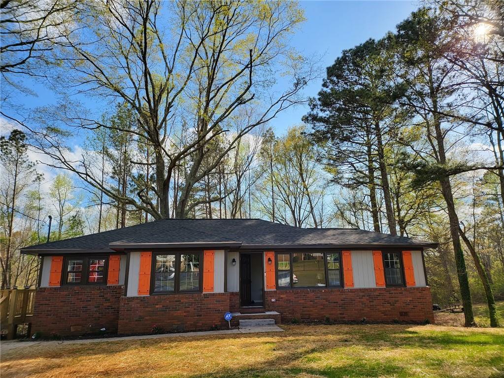 PRICE IMPROVEMENT! AGENTS - 4% Commission and $2500 Seller Credit, on this Full Renovation in Griffin Ga! You'll love the details throughout, featuring a Brand New Kitchen with all New Appliances. A Beautiful Island that can be repositioned anywhere in the room. A fully renovated Main Bathroom and a totally new Half Bathroom. This home also boasts a New Roof with a 50 year Systems Plus warranty and a 25 year workmanship warranty. New Gutters! There are three bedrooms and NO Carpet in the entire home. Check out the beautiful, original hardwood floors! Updated Electrical/Plumbing and HVAC. Interior/Exterior Paint and new Fixtures. This home comes with an ADT alarm system that is prepaid for 3 years and the home is already equipped with security cameras. Enjoy your evenings on the New Deck, with solar lights that overlooks the backyard. Welcome Home!