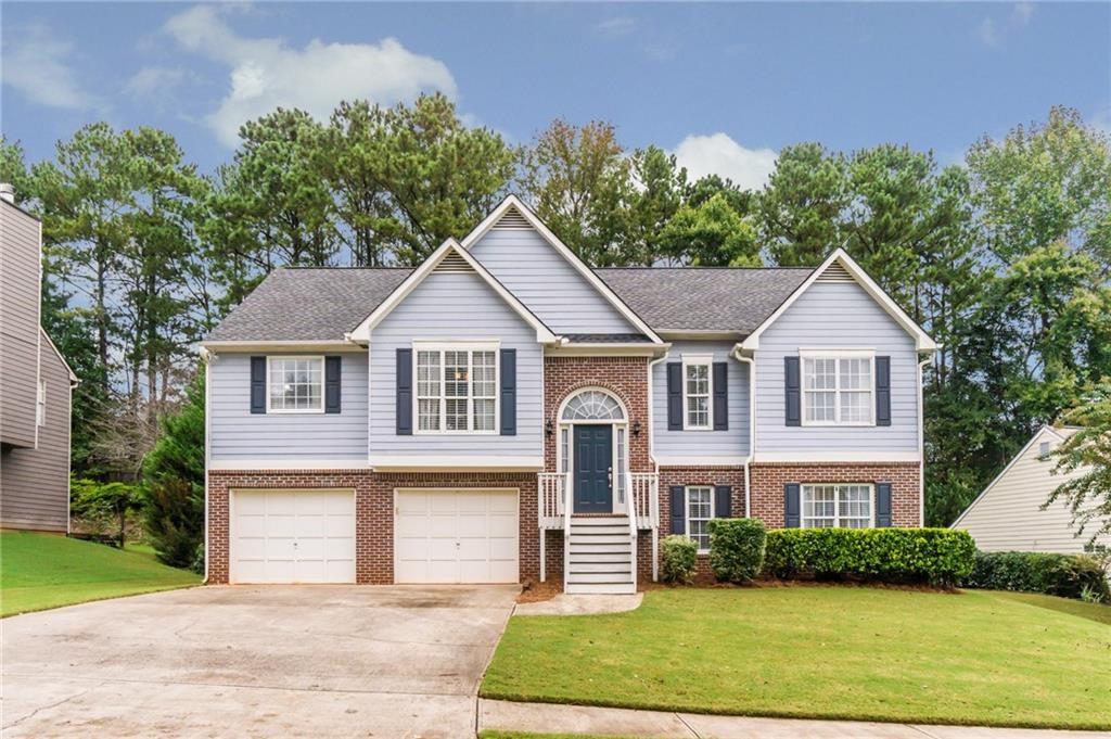 Immaculate ranch style home with private entry, garage, and extra parking.Spacious open layout with 3bedrooms /2bath, updated finishes.Open Kitchen view to Family area. Master retreat offers a soaking tub and double vanity.Resort-style amenities: pool w/ slide, tennis, playground, pavilion. Prime location near Downtown Woodstock, The Shoppes of Atlanta & greenway trails.The truss level is rented to different family with their complete private access.