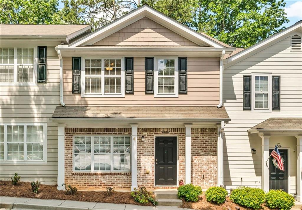 Welcome to your dream home in the heart of Alpharetta! Located in a quiet, gated community, this charming 2-bedroom, 2.5-bath residence combines comfort, style, and convenience. The bright and inviting main level features a spacious family room and separate dining area—perfect for entertaining. The kitchen boasts white cabinetry, granite countertops, and ample storage, with a seamless view into the living spaces for easy hosting and connection. Step outside to your private, fenced patio with custom stonework—an ideal spot for morning coffee or evening gatherings. Upstairs, enjoy a thoughtfully designed split-bedroom layout, each with its own ensuite bath for ultimate privacy. The spacious primary suite offers a luxurious bath with a double vanity, whirlpool tub, and separate shower. An upstairs laundry room adds everyday ease. Additional upgrades include newer HVAC system and modern stair railing, enhancing both comfort and style. Refrigerator, washer and dryer are 9 months old and hot water heater is 6 months old. All of this is just 1.5 miles from vibrant Downtown Alpharetta and within walking distance to Wills Park and Mid Broadwell Park. Quick access to GA400, Avalon, Downtown Crabapple, shopping, dining, and entertainment makes this location unbeatable.