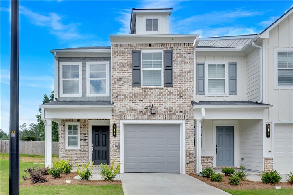 Move-in ready and full of charm, the Oleander at Village Green is a well-designed 3-bedroom, 2.5-bath new construction, END UNIT townhome. The open-concept main level features LVP flooring, a linear fireplace, and a stylish kitchen with painted 36 inch cabinets, granite countertops, tile backsplash, and a spacious island with overhang—perfect for entertaining or everyday living. All appliances are included for added convenience.
Upstairs, the private primary suite offers a cozy sitting area and a spa-like bathroom with tile flooring, double vanities, and a walk-in closet.
Located in Adairsville with easy access to I-75, Village Green offers affordable, low-maintenance living with builder warranties and 100% USDA financing options available. Ask about our builder-paid incentives when using our preferred lender.