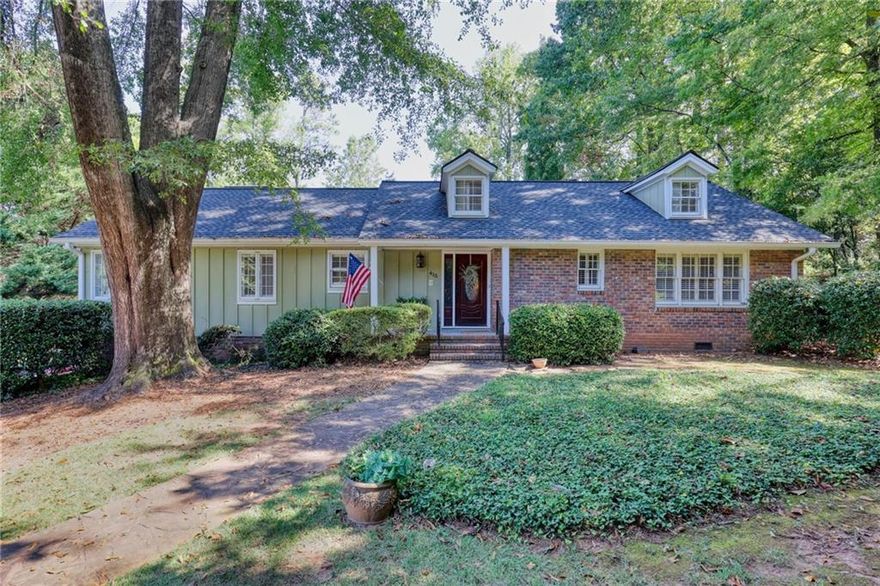 Charming Cape Cod Cottage with Guest House in Whitlock Heights!  Discover this hidden gem in the highly sought-after Whitlock Heights neighborhood of Marietta! This enchanting Cape Cod-style cottage is a standout on its own, but when you add in the stunning outdoor entertaining area, complete with a heated in-ground pool, hot tub, and a cozy stone fireplace overlooking the golf course, you’ve found the ultimate retreat!  The main home combines the convenience of one level living with plenty of room to spread out in the open living spaces that are accentuated by hardwood floors throughout, beautiful built-in cabinetry and large windows that frame picturesque views and provide an abundance of natural light. The  spacious primary suite has been thoughtfully extended to include a relaxing sitting area, a generous walk-in closet, and a luxurious bathroom boasting vaulted ceilings, a clawfoot tub, a large shower, and a double vanity.   The impressive guest house, built in 2007, offers an inviting open-concept layout on the first floor, complete with a modern kitchen, a fireplace, and ample room for entertainment—perfect for hosting friends or family. Upstairs, you’ll find two comfortable bedrooms and a full bath, ensuring privacy and convenience for your guests.  Both homes have been meticulously maintained, featuring roofs that are just one year old. The main house also includes a drive-under two-car garage and ample unfinished storage space in the basement, plus a cedar closet and additional washer/dryer hookups for your convenience.  Don’t miss your chance to own this exceptional property where charm meets modern amenities in a stunning setting. Schedule your showing today!    *Unable to provide drone photos due to restricted air space. Lot size is inaccurate in tax record - it is approximately 3/4 acre.