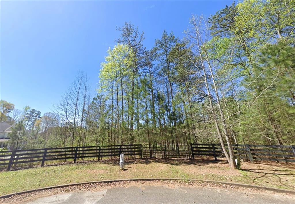 Luxury Custom Home Lot - Incredible opportunity to build your luxury dream home on 2+ acres or 6.52 acres (121, 124, & 126 Aaronwood Ct) in one of Alpharetta’s most desirable and private cul-de-sac locations. Nestled among mature hardwoods and natural landscape, this gently rolling lot offers the perfect canvas for a high-end custom estate with endless possibilities—whether you envision a sprawling modern farmhouse, a timeless Southern retreat, or a transitional masterpiece with resort-style outdoor living.
With no HOA, you’ll enjoy full creative freedom to bring your architectural vision to life—add a pool, outdoor kitchen, guest house, or design for multigenerational living. The lot provides space, privacy, and flexibility rarely found in such a prime location.
Conveniently located just minutes from Downtown Alpharetta, Milton, Avalon, top-rated schools, and GA-400, this exceptional property blends the serenity of estate living with unmatched access to dining, shopping, and major commuter routes. Don't miss this rare opportunity to own and build in North Fulton County. Whether you're a buyer looking to create a forever home or a builder seeking a prime homesite, Aaron Wood Ct is ready to bring your vision to life.
Total land frontage for the land totals 164 Feet or lot average is . The parcels can be sold individually or as an assemblage of 6.52 acres. The property is in a subdivision where the last home sold for over $900K on a lot of 2.14 acres. Each lot has a different parcel number and legal description. Lot 6: 2.23 Acres 02N12 100; Lot 7: 2.15 Acres 02N12 101; Lot 8: 2.14 Acres 02N12 102