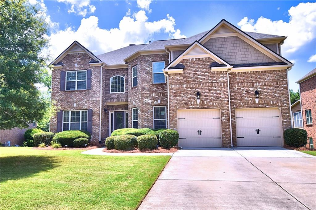An exceptional executive level home in a fabulous community with resort style amenities. Stately mix of 4 sides brick and stone exterior. Grand 2 story entry and family room with a wall of windows, book shelves, and fireplace. Spacious kitchen features a mix of white & stained cabinetry, granite countertops, huge work island and all nearly new stainless steel appliances. Guest suite on the main level with a full bath. Gorgeous primary suite with sitting room, tray ceiling and spa bath. Primary bath includes a frameless shower, soaking tub and a steam bath located in the walk in closet. Teen suite with a private bath and 2 additional bedrooms with a shared bath. Hardwood floors throughout most of the main level. Terrace level includes a terrific home theatre with unique décor and the equipment will remain for the tenants enjoyment. Terrace level has a game room and a bedroom and full bath. A true back yard oasis featuring a fenced, level and private back yard, play area, plus a huge deck and patio below. Outstanding neighborhood amenities include a junior Olympic pool, 4 lighted tennis courts, playground and clubhouse. Easy access to schools, shopping, parks and many other amenities. Furnishings are negotiable and can remain or be removed.