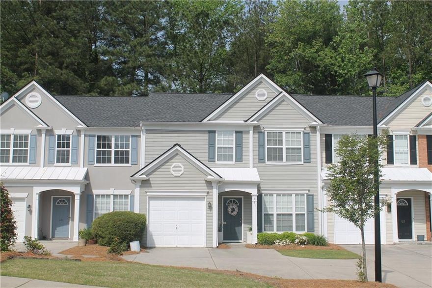 This townhome is beautifully maintained! Located in Fairview Townhomes, a swim community in Alpharetta / Milton, it’s just minutes to Avalon, Halcyon, and downtown Alpharetta. Interior of the home is the largest floorplan in the community and has 3 Bedrooms / 2.5 Bathrooms, newer hardwood floors on main level, top quality granite in Kitchen, stainless steel appliances & and a multifunctional custom island in the Breakfast area. The oversized Primary Bedroom opens to the Primary Bathroom with raised Granite counters, separate shower, soaking tub, and newer hardwood style floors. The Rear Yard is privacy fenced and backs up to peaceful, wooded green space. Roof is only 3 years old. A huge bonus: Water/Sewer costs are included in very reasonable monthly HOA fees. This is truly an excellent home in a wonderful neighborhood!