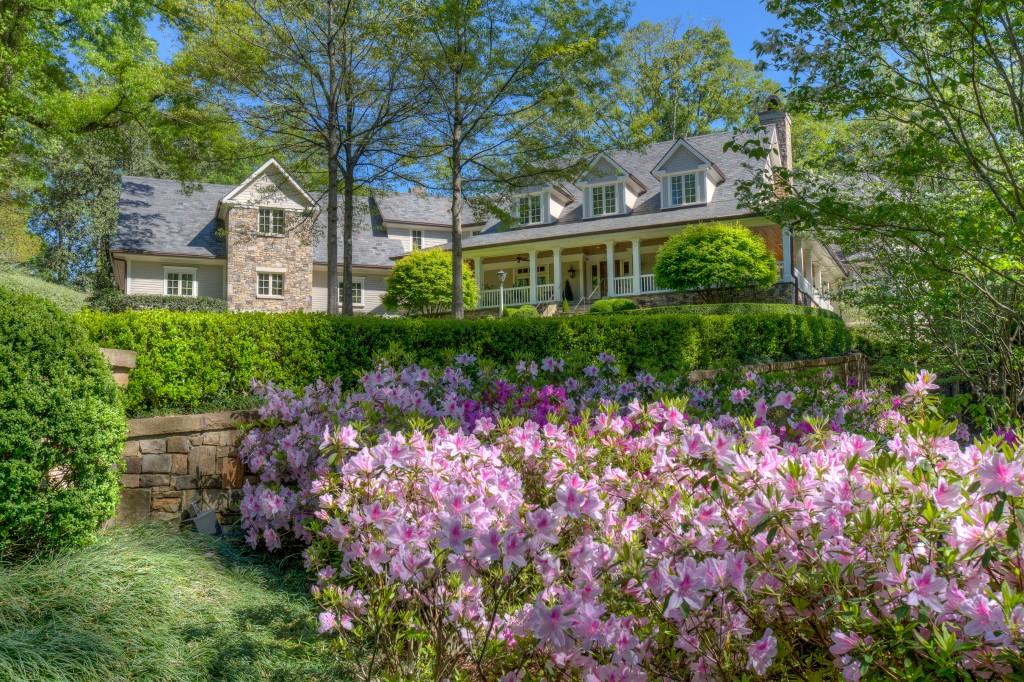 Warm and inviting, very high quality estate home on 1.8+- Acres. Porches,slate roof,wide plank reclaimed oak floors,elevator,generator. Screened in porch with grill, stone f'place,stone floor,wood ceiling. Gorgeous saltwater pool/waterfall/spa,landscape/hardscape(beautiful stonework),all designed by Land Plus. Amazing 2200+- wine cellar, au pair suite/in-law/bonus room. Terrace level complete with kitchen & rec room, beamed tv room/fireplace, guest suite...lots of windows/light. Best Buckhead location, convenient to Chastain Park, private schools, shopping, restaurants.