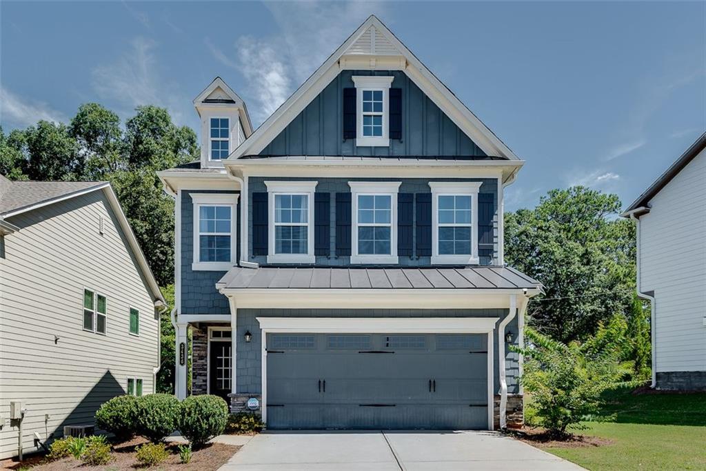 MAJOR Price Reduction! Welcome home! This nearly new 4-bedroom, 2.5-bath, 2022-built home has been meticulously cared for with smart upgrades throughout for the modern and savvy homeowner. In addition to being in immaculate new construction condition, they’ve also lived through the “discovery process” and said goodbye to builder grade, and hello to top of the line! With care and attention in every detail, the home improvements include a completely new top of the line HVAC system, a custom frameless shower in the primary suite, a sleek tiled fireplace, smart switches throughout, upgraded ceiling fans, under-counter kitchen lighting, a water recirculator pump, a smart water shut-off valve, an upgraded hybrid water heater, and an upgraded dishwasher. The main level is open-concept done right, with a seamless flow between the kitchen, dining, and living room, all centered around an oversized kitchen island. With the backyard patio right off the living room, the amount of natural light that flows into the space is spectacular. It’s the perfect entertainment space, as well as a comfortable home to live in day to day. The oversized primary suite is a dream. This room is huge! With a gorgeous double tray ceiling, offered only in select models, a spa-inspired soaking tub under the window, a large shower, and elegant tile, it makes a great space even nicer. The secondary bathroom also has a large shower. This home is better than new already, and the best opportunity at Envoy. Envoy is a top tier community in Scottdale, one of the fastest growing neighborhoods in the country, and built by one of the nation’s top builders, Lennar Homes. The community association also maintains the 3 lovely mini parks and provides your lawn care. Location is prime with quick access to downtown Decatur, Stone Mountain trail, highways and more.
