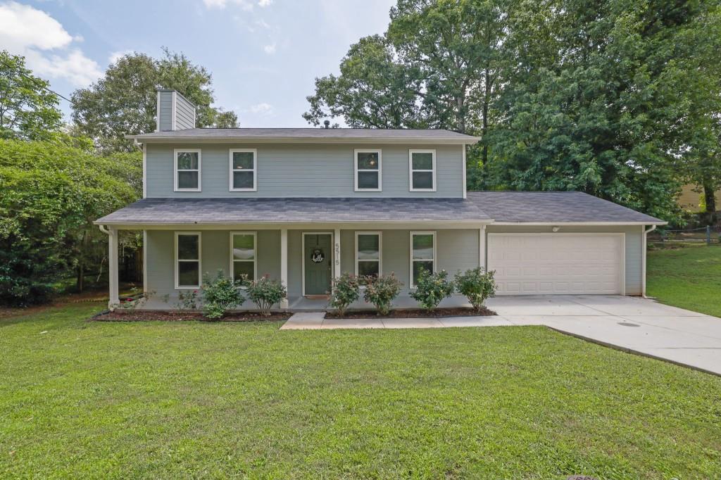 Welcome to this classic two-story home, tucked into a quiet neighborhood just minutes from the best of Stone Mountain. With 3 bedrooms, 2.5 bathrooms, and a spacious layout, this move-in ready home offers comfort, functionality, and charm whether you're planting roots or looking for a smart investment. Step inside to find a warm, light-filled living room anchored by a cozy fireplace, a dedicated dining room for gatherings, and a kitchen outfitted with updated appliances and granite countertops. The layout flows easily for everyday life, with both an eat-in kitchen nook and a formal dining area ideal for everything from morning coffee to hosting friends. Upstairs, the oversized owner's suite provides a peaceful retreat, while two well-sized secondary bedrooms offer flexibility for members of your household, guests, or work-from-home needs. Outside, the fully fenced backyard is a blank canvas ready for play, gardening, or outdoor entertaining with plenty of space to easily bring your vision to life. Just a short distance from Stone Mountain Park and minutes from neighborhood favorites like Gilly Brew Bar, Vibrary Wine & Book Bar, Outrun Brewery, and Cherokee Rose Restaurant you'll love the blend of peaceful living and local amenities. Whether you're seeking a primary residence or an income-producing rental, this home checks all the right boxes.