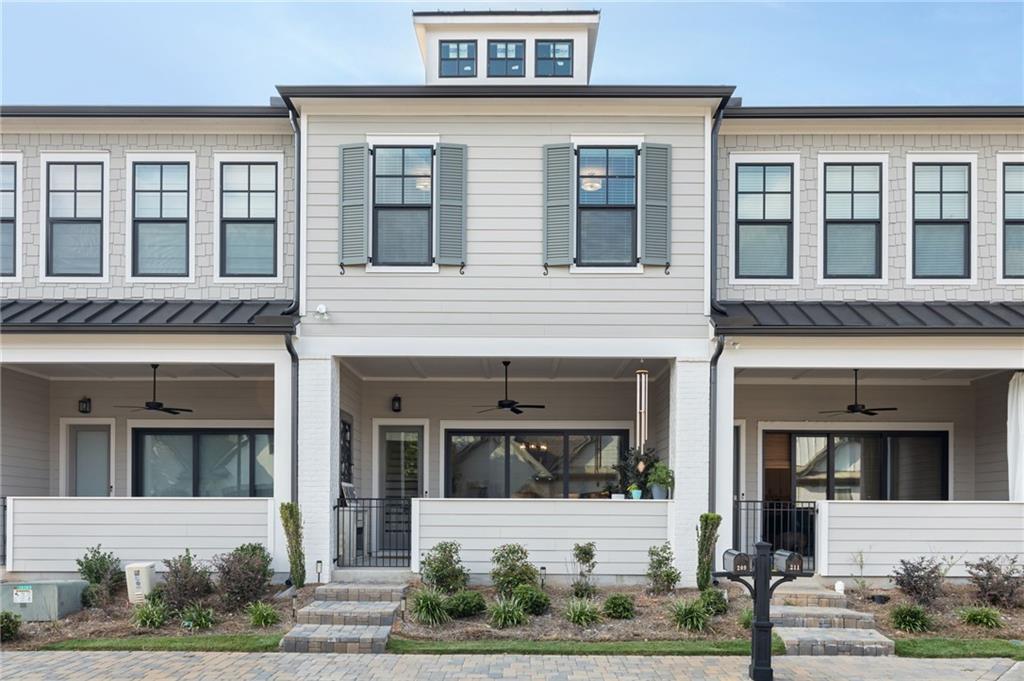 GORGEOUS Like-New Luxury Townhome in Sought After Village at Towne Lake! Beautiful finishes throughout and pics will be coming soon. Come look inside our beautiful townhome to find an inviting, open-concept floorplan. The large slider doors in the family room open to a beautiful outdoor space with a covered porch great for entertaining or enjoying your morning coffee or cold drinks after a long day. Enjoy your nights cooking and relaxing w/ an open chef-inspired kitchen & living area w/ 10+ ft ceilings. This home has modern touches like stone countertops w/ plenty of cabinets in Kitchen as well as upgraded lighting As you travel upstairs, you will notice 10ft ceilings and an open rail staircase. The owner’s suite showcases a modern light double vanity w/ upgraded countertop, an oversized shower & expansive walk-in closet designed. 2 additional bedrooms with walk in closets, LOFT and full bath with tiled walls complete the upper level.
If you’re looking for a modern, spacious plan, this is your new home! Not only will you enjoy the stunning features of this new home, the community is also gated and beautifully maintained. Village at Towne Lake offers a range of excellent amenities to enjoy such as: a pool, pickleball court, bocce ball, fire pit, a dog park and more. Welcome to Woodstock, voted the 17th Best Place to live by Money Magazine!!