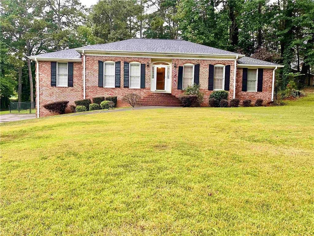 Welcome to Bethsaida Woods community offering timeless curb appeal with no HOA fees! This featured four-sided brick home is elegant and beautifully maintained in a serene community. Property Highlights: Expansive fenced yard and manicured lawn - perfect for large gatherings and outdoor entertaining. Fully finished basement featuring a custom builtin bar and versatile bonus rooms ideal for gaming, media, guest suites, or a home office Convenient bathroom on basement level. Main Level Living: All bedrooms located on one level for easy accessibility Spacious kitchen complete with breakfast nook and detailed finishes Formal dining room ideal for family dinners or hosting friends Inviting living and family rooms, connected by beautiful hardwood floors and anchored by a cozy fireplace Outdoor Living: Fabulous private rear deck, designed for BBQs and leisurely summer evenings.