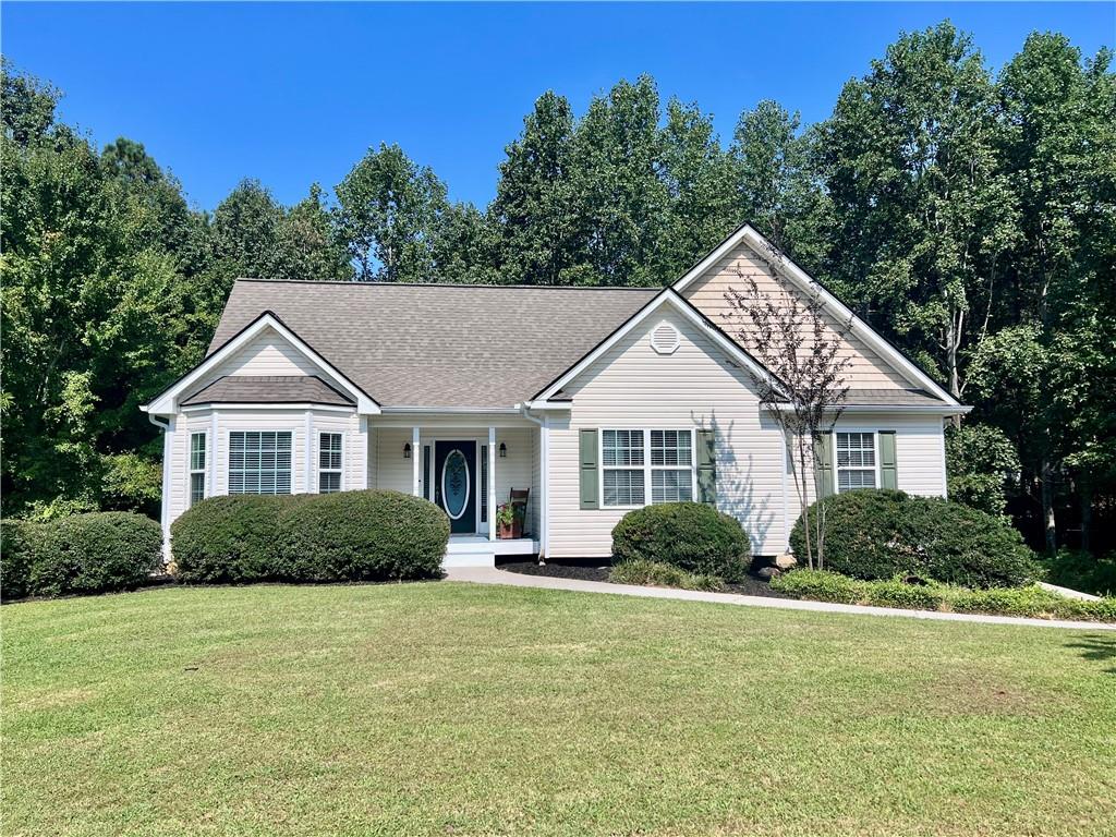 Welcome to this beautifully maintained 3-bedroom, 2-bathroom home nestled in the heart of Ball Ground, a small-town community with timeless charm in Cherokee County. Featuring a bright and open floor plan, this home is designed with both comfort and entertaining in mind. The owner’s suite offers dual closets and a spacious bathroom complete with double vanities. The partially finished basement provides plenty of potential—ideal for creating additional living space, a home office, or a recreation area tailored to your needs. Enjoy small-town living with easy access to nearby conveniences, award-winning schools, medical care and major highways. This home perfectly combines functionality, charm, and future possibilities.
Bonus: Seller is offering a flooring allowance with a reasonable offer—making it even easier to make this home your own.