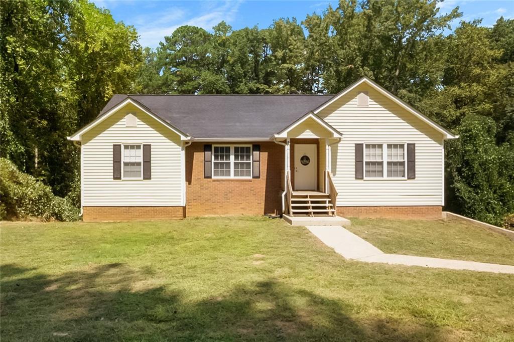 Welcome to this beautifully updated home in Desirable North Landing a wonderful East Cobb community. Step inside to find a bright and open layout. The home has been recently remodeled, offering a fresh and modern feel throughout. Stunning kitchen with white cabinets, sleek elegant-style countertops, black accents, stainless steel appliances, and abundant natural light from skylight. Bright open-concept living and dining space with modern finishes, neutral tones, and seamless layout ideal for gatherings. Spacious & Private master suite featuring a stylish accent wall, extra sitting space with abundant natural light, and direct access to the luxurious en-suite bath. Elegant master bath with sleek double vanity, quartz countertops, modern black fixtures and an oversized walk-in shower with marble-style tile and glass enclosure. A spacious walk-in closet with custom shelving offers ample storage and organization. Down the hallway, you'll find two additional spacious bedrooms, including a beautiful guest bath with the same elegant touches as the master bath.
Major systems have already been taken care of for peace of mind — the roof, HVAC, and water heater replaced in 2018. With these big-ticket items already done, you can simply move in and enjoy. Conveniently located near local schools, shopping, and dining, this home combines comfort and convenience in one great package. Take advantage of the Optional HOA, Amenities include a 14-acre lake for fishing, a saltwater pool, tennis and pickleball courts, an 18-hole Disc Golf course, children's playground and a Clubhouse available for rentals.