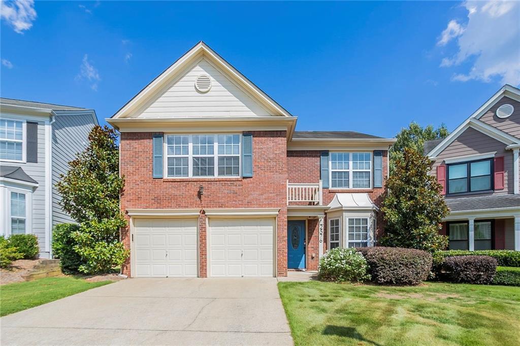 Welcome to this spacious 3-bedroom, 2.5-bath traditional home tucked within the highly desirable Park at Vinings community. This two-story residence offers a bright and open layout with defined living and dining spaces, high ceilings, and a cozy fireplace in the living room. The kitchen features white cabinetry, stone counters, and a breakfast nook overlooking the private fenced backyard and patio—ideal for quiet mornings or evening gatherings. Upstairs, the oversized primary suite includes a walk-in closet and dual-vanity bath with soaking tub. With a 2-car garage, low-maintenance lot, and access to a community pool, this home blends comfort and convenience just 20 minutes from Downtown Atlanta.