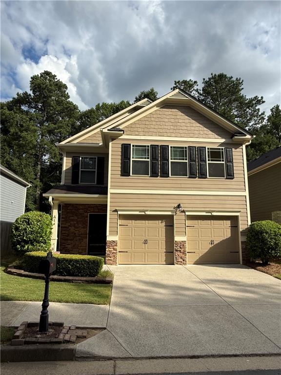 Located in the highly sought-after Woodstock school district, this inviting four-bedroom, two-and-a-half-bath home offers a warm blend of comfort and style, beginning with a two-story foyer that welcomes you inside. The spacious kitchen is the perfect place to gather with rich 42" stained cabinets, gleaming granite countertops, and a convenient passthrough window that frames a view into the cozy living room. The main living area is completed with an adjoining dining area, access to the backyard and garage, and a half bath. Upstairs, the serene master suite offers a private retreat complete with tray ceilings and an ensuite
bath featuring a soaking tub, separate shower, and dual vanities. Three additional sunlit bedrooms and a second full bath provide ample space for family or guests. Just a short drive to downtown Woodstock’s vibrant shops, restaurants, parks, walking trails and entertainment, and with an all-inclusive HOA that takes care of lanscaping and amenities, this home is a harmonious blend of modern living, natural charm and hassle-free lifestyle. This property won't be available for long... schedule your showing today!!