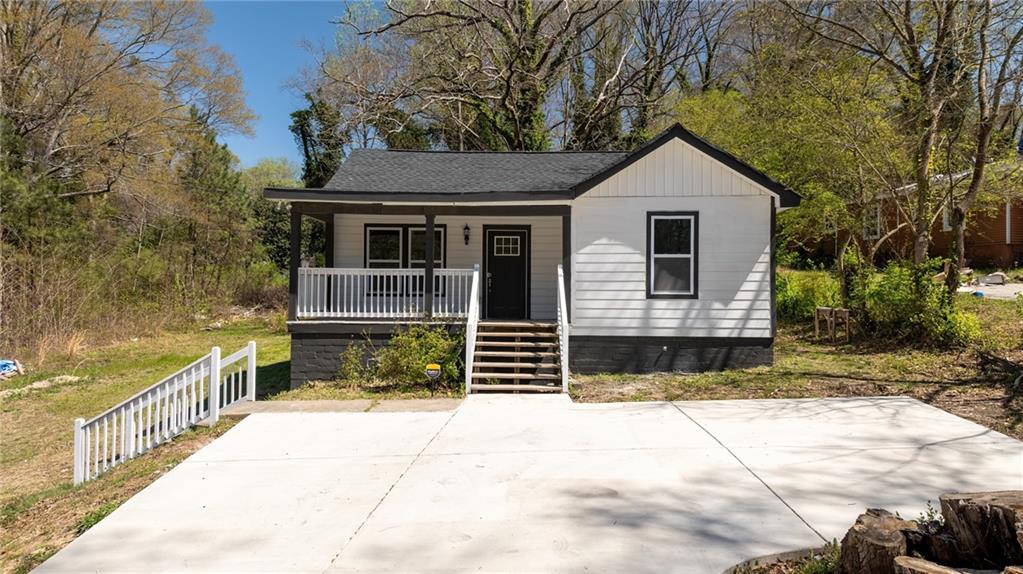 Nestled in the charming Grove Park neighborhood of Atlanta, this beautifully remodeled 3 bedroom and 2 bathroom home seamlessly blends classic character with modern updates. With 1,573 square feet of thoughtfully redesigned space, this residence offers a fresh take on timeless appeal. A spacious new addition enhances the home's original layout, featuring an open floor plan that maximizes natural light and flow throughout. Vacant. Go and show this spacious layout with contemporary updates, it's the perfect place to call home. This home has been virtually staged.