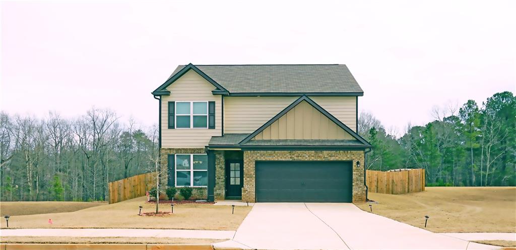 Back on the market...buyer financing fell through...Welcome Home! Newly built home with open and spacious rooms throughout. The kitchen features 42 inch cabinets with crown molding, granite countertops, backsplash, stainless steel appliances, and Island with breakfast area. The dining room comes with coffered ceiling. The owner's suite features trey ceiling, sitting area and the owner's spa has a 6 foot tub, a tile shower, and walk in closet! In addition, there are 3 spacious bedrooms. Enjoy your privacy with a fenced in back yard. Great location with close proximity to shopping and restaurants.