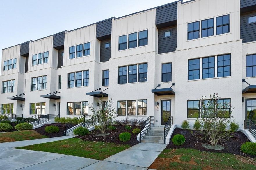 Brand new modern and luxurious townhome in The Gathering Alpharetta on the ALPHA LOOP!  Enjoy modern and sophisticated suburban living with all the comforts and conveniences you need.  With 4 bedrooms, 3.5 bathrooms, and three stories of thoughtfully designed interiors, this home offers the perfect blend of modern style and comfort.  As you enter the first floor, you'll find a spacious guest suite complete with its own private bathroom, ideal for visitors or a home office. The entryway also provides convenient access to the attached two-car garage.  Ascend to the second floor to experience the heart of the home, an open concept living area designed for both relaxation and entertainment. The expansive living room, featuring 10 ft ceilings and lots of large windows, seamlessly flows into the dining area and gourmet kitchen. The kitchen is a chef's dream, boasting Kitchen Aid stainless steel appliances, quartz countertops, sleek cabinetry and a generous island. Off the kitchen you'll find a walk-in pantry plus a kitchen office space, which can also be used for extra storage of kitchen appliances, etc. The third floor is dedicated to privacy and tranquility offering the primary suite and two additional bedrooms. The luxurious primary suite features a walk-in closet and spa-like bathroom with a raised maple dual vanity and glass enclosed shower. The third floor also features a stylish full bathroom and a laundry room.  Brand new washer and dryer are included. The Gathering is a vibrant new community with retail shops and restaurants coming soon!  It is walkable to downtown Alpharetta and a 5-minute drive drive to Avalon.  Plus, top-rated schools as well as prime access to the Alpha Loop.  Owner requires a minimum one-year lease, credit score >700, clean credit, income 3X monthly rent.  $10K security/damage deposit due at lease signing.
