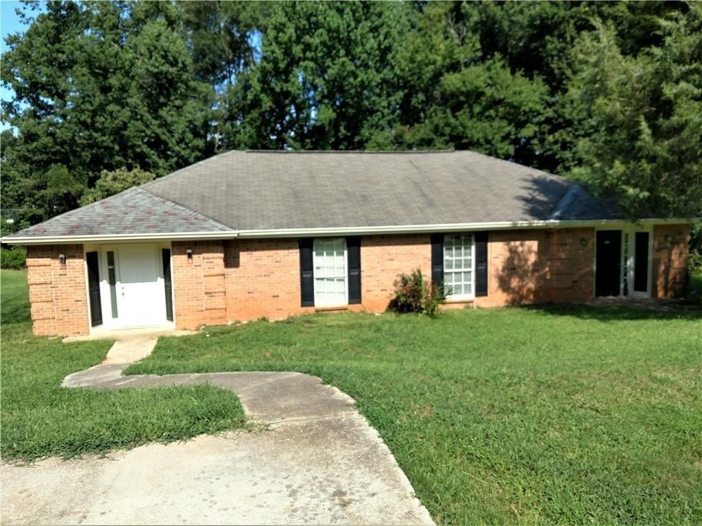 Investor special in the heart of Lawrenceville, GA! 295 Forest Pl. presents a rare opportunity to own a solid investment property just minutes from downtown Lawrenceville. This charming duplex features spacious units with strong rental potential. Perfect for investors looking for immediate cash flow and long-term appreciation. Do not disturb the tenants.