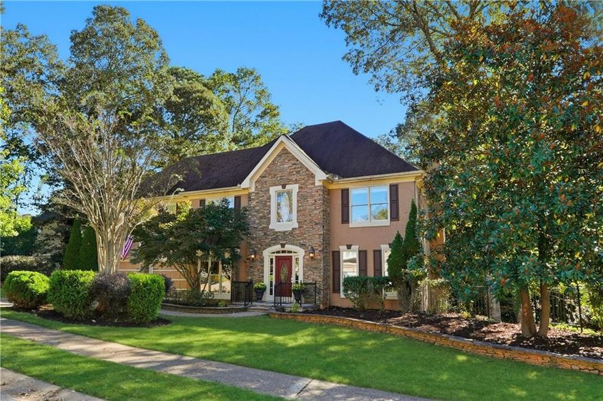 Wow, this is a fantastic opportunity in sought-after Eagle Watch golf community!  This hard-coat stucco home is priced below fair market value for a quick sale.  The main level features a grand 2-story foyer with hardwood floors, formal dining room, office with french doors, closet and stunning beveled glass transom window, built-in bookcases and stone gas fireplace in the living room.  The eat-in kitchen offers so much character with pull-out cutting boards, a wine rack, a desk and stainless steel appliances.  Upstairs, you will find a huge primary suite with large walk-in closet and sitting room, along with 3 secondary bedrooms.  The finished basement offers another living room, full bathroom, & bonus room, along with unfinished storage/work room.  The 2-story deck is great for entertaining or watching the deer in your private backyard. The 30-year architectural roof is in great condition with 18 years of life left.  With a little TLC this home could be truly spectacular! Eagle Watch offers multiple pools; tennis, pickleball, volleyball, and basketball courts; a fitness center; golf course; clubhouse; walking trails; close proximity to Lake Allatoona.  Be sure to check out the 3D tour. Home is being sold AS-IS.  All square footage is approximate.