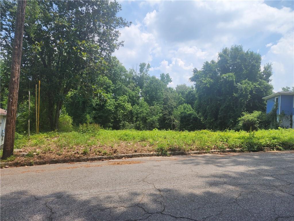 Prime Buildable Lot in Growing Area - Utilities Already On Site! Attention investors and developers! This .48-acre lot is ready for your next project. Previously home to a residential structure, the electricity and public water connections are already in place saving you time and money during development. Located in an area seeing rapid new construction and revitalization, this is the perfect opportunity to build a dream home or income-producing property. Don't miss your chance to invest in a thriving community with rising property values and strong buyer demand.
