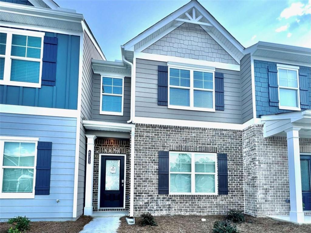 Welcome to your perfect autumn retreat! This beautifully maintained modern townhome offers the ideal blend of style, comfort, and functionality—just in time to nestle in before the holidays. Step inside and you are greeted by a versatile flex room—the perfect space to customize as a home office, playroom, dining room, or creative retreat. The open and airy floorplan flows into a chef’s kitchen with granite countertops, sleek gray cabinetry, and a spacious island with undermount sink—ideal for cooking and entertaining. Unwind in the family room with a cozy fireplace, creating the perfect setting for fall evenings. Upstairs, the owner’s suite impresses with its size and privacy, complete with a spa-inspired bath featuring dual vanities with granite counters and a large walk-in shower. Two additional bedrooms and a hall bath with granite countertops provide plenty of space for family or guests. Enjoy your private backyard for crisp fall mornings and year-round relaxation. With its unbeatable location and thoughtful design, this home is ready for you to create lasting memories. Do not miss your chance to move in before the holidays—this is the home sweet home you have been waiting for!