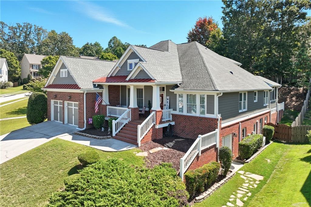 Welcome to Your Dream Home in Sterling on the Lake! This stunning Craftsman-style brick veneer home perfectly blends charm, functionality, and lifestyle. With 5 bedrooms, 3.5 baths, and 2,909 sq. ft. of thoughtfully designed living space, this home is ideal for families and those who love to entertain.
Tucked on a quiet, family-friendly street, the property boasts a steep driveway that leads to an oversized garage with a surprising amount of extra space — perfect for larger vehicles, trash can storage, and more.
Inside, you’ll find an open floor plan filled with natural light, creating a warm and inviting atmosphere. The chef’s kitchen features a Gas Flex Duo Range with dual doors (also prepped for electric if preferred), granite countertops, and plenty of prep space for hosting family get-togethers or parties with friends.
Upstairs, a private guest or teen suite offers comfort and privacy, while the spacious primary suite includes a cozy sitting/reading area for your own retreat.
The basement offers even more versatility, with space for a shop or hobby area plus a side entrance to a fully equipped dog grooming business — freshly cleaned by Stanley Steamer and available for sale separately as a profitable turnkey opportunity.
Relax in the peaceful backyard on your screened-in porch. You are surrounded by great neighbors that are there to lend a hand. Here, you’re not just buying a home — you’re buying a lifestyle. Enjoy neighborhood concerts, fireworks, community events, pools with lifeguards, and endless outdoor activities like kayaking, walking trails, tennis, and pickleball.
Come see why life is better at Sterling on the Lake — this home is ready to welcome you!