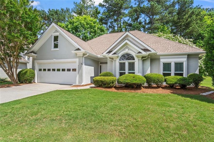 Look No Further—One-Level Living at Its Finest!
Welcome to this stunning ranch home in the sought-after Graystone of Windward community in Alpharetta! Featuring a spotless quartz kitchen with an updated backsplash, stainless steel appliances, and gas cooktop, this home is designed for easy living. The charming eating area overlooks the private backyard and vaulted fireside great room.
The primary suite boasts a spacious private bathroom with double vanity, separate garden tub and shower plus large walk in closet. Two additional bedrooms, one bedroom enjoys custom built-ins designed for an office or bedroom.  Thoughtful upgrades include ceiling fans, blinds, and convenient walk-up attic access with ample storage and large two car garage.  
Step outside to enjoy the large private fenced backyard and patio. Conveniently located off Windward Parkway, just minutes away from Avalon, Alpharetta City Center, shopping, dining, and more, this home has been maintained to perfection.
Windward Enjoys World Class Amenities Where Dreams Live!  195 Acre Private Lake, available to all residents.  Sports Park with Fantastic Playground, Basketball Court, Gazebo, Dog Park, Community Garden and so much More!  Optional Swim/Tennis at Windward Lake Club  Top-rated, award-winning schools complete this exceptional opportunity!