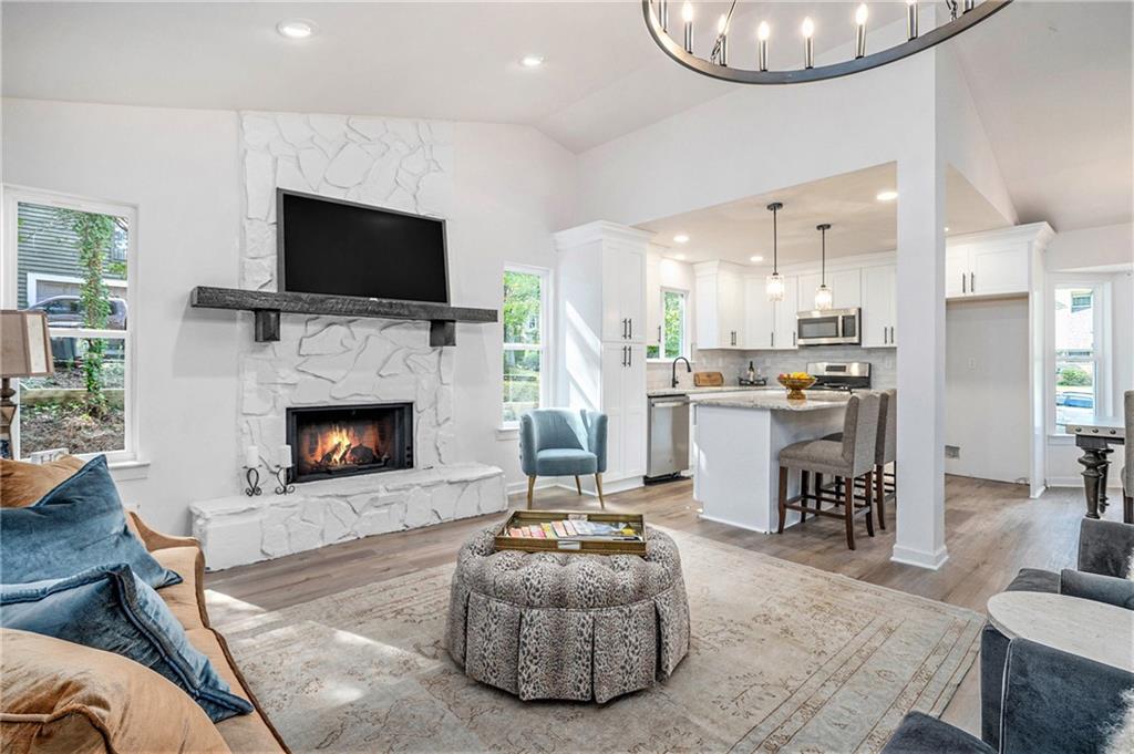 Better than New! Stunning Renovation one mile from all the action on Canton Street in downtown Roswell! A beautiful 2-story foyer welcomes guests. Open floor plan! Entertain in the amazing Chef's Kitchen with large island, Granite Countertops, Stainless Appliances, that opens to the vaulted fireside Great room. Relax on the Screened Porch or new Deck overlooking a Gorgeous large flat park like backyard. Spacious guest Bedroom on Main, great for an office, full bath with newly tiled shower. Gorgeous Master Bathroom with tiled Shower and floor, double vanity and Soaker tub. The home features new Siding, Windows, HVAC, Interior/Exterior Paint, New Lighting/Pluming Fixtures, New Carpet and LVP; replaced all exterior lights and added motion sensor lights to front and back corners of the home. New pex plumbing throughout!