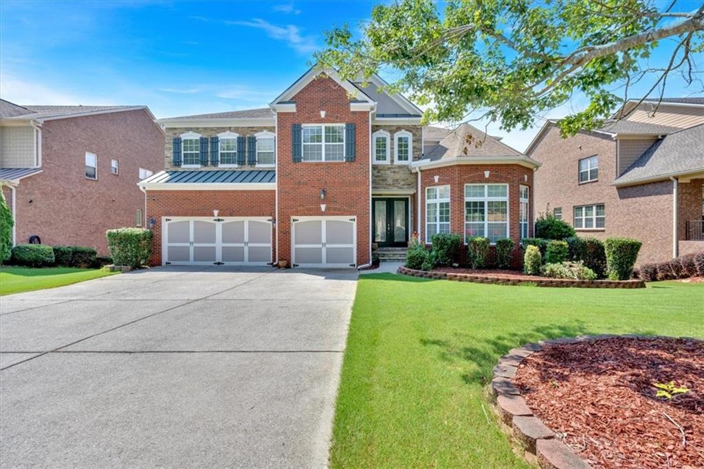 Welcome to 3819 Courson St in sought-after Marietta, GA—an exceptional all-brick home offering the perfect blend of luxury, functionality, and space. This stunning residence features 5 spacious bedrooms and 4.5 beautifully appointed bathrooms, ideal for both everyday living and entertaining.Step inside to be greeted by a soaring cathedral ceiling in the living room, anchored by a cozy fireplace that creates a warm and inviting ambiance. The chef’s kitchen is a showstopper, complete with a large center island, granite countertops, and top-tier finishes—ready for gourmet meals and gatherings alike.Downstairs, the finished basement is a true entertainer’s dream. Enjoy movie nights in your very own private theater, or host with ease thanks to the wet bar and kitchenette—perfect for guests or multi-generational living.Additional highlights include a three-car garage, generous living space throughout, and premium details that set this home apart. Conveniently located near top-rated schools, parks, and local amenities—this home is a rare gem in Marietta!